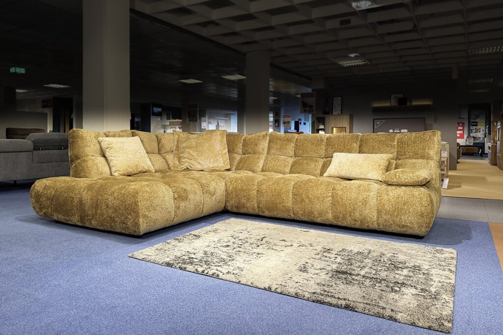 Eckkombination Stoff Shaun old Gold ink. Kissen